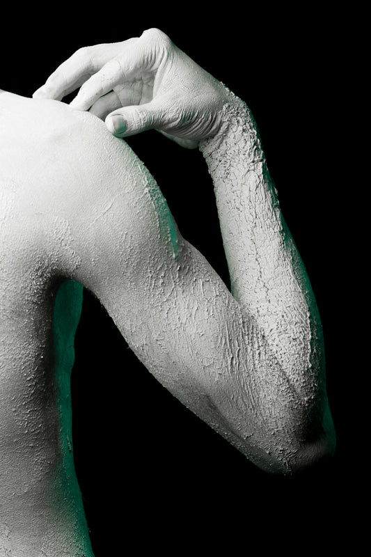 person with green paint on hand