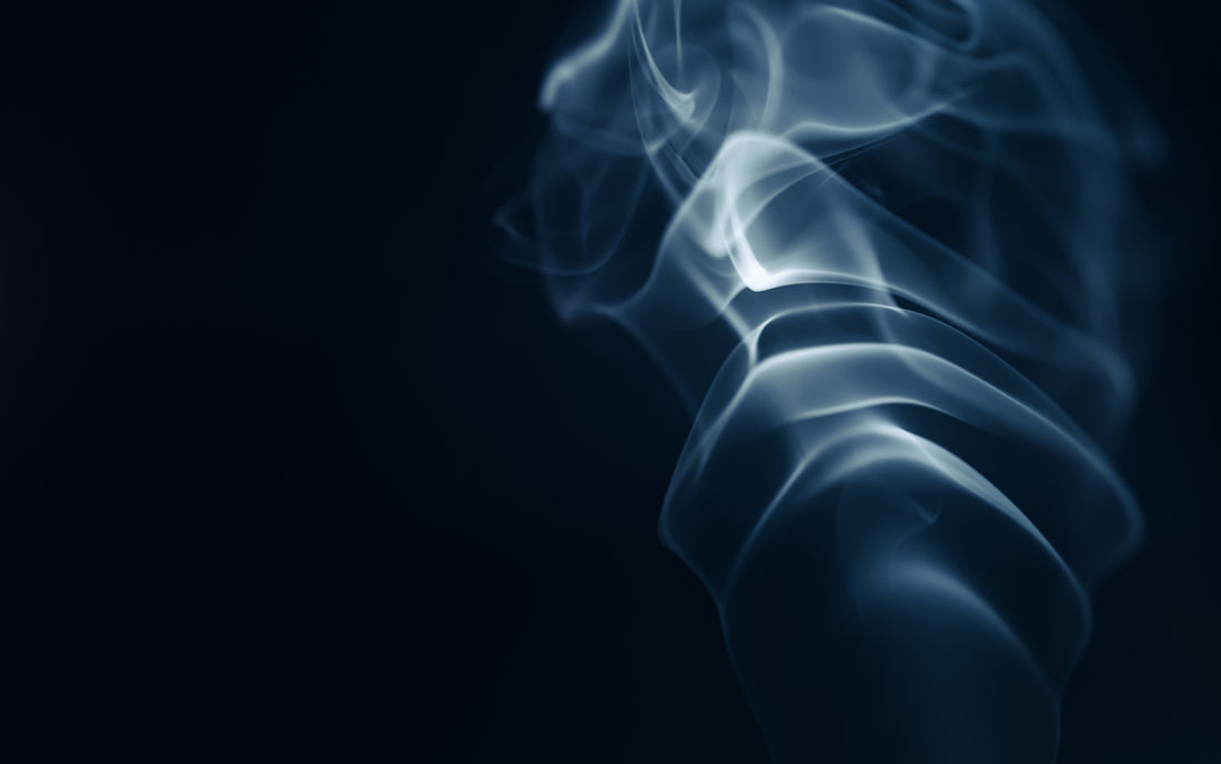 a blue smoke texture on a black background