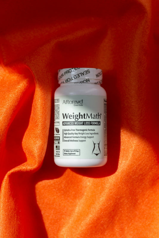 A bottle of weight matters sitting on a bright orange cloth
